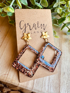 Boucles résine (marron doré)