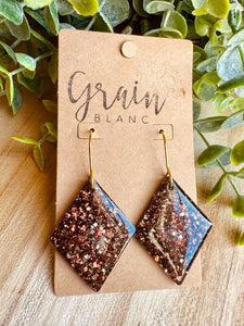 Boucles résine (marron doré )
