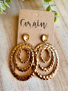 Boucles en acier doré