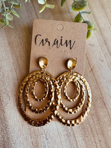 Boucles en acier doré
