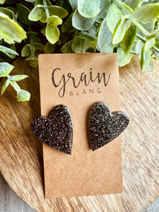 Boucles coeur en résine (paillettes noires argentées)