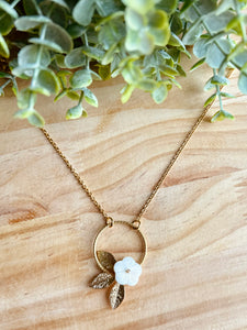 Collier disque avec fleur